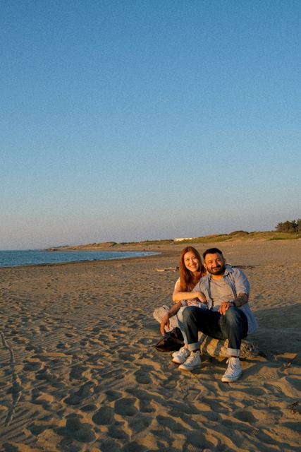 Couple on a beach at sunset